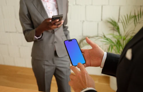 Businessman typing on a iPhone mockup