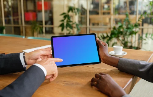 Businesspeople working on an iPad Air mockup