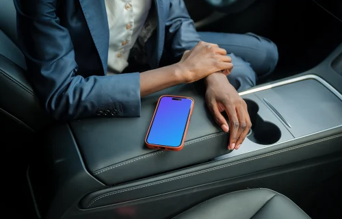 Businesswoman and iPhone mockup in Tesla