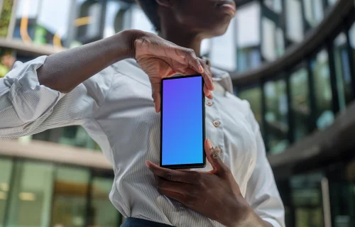 Businesswoman holding a Google Pixel mockup