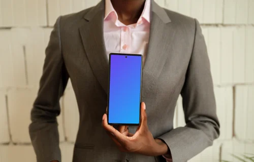 Businesswoman with phone in the office workspace