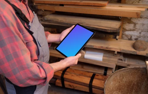 Carpenter holding an iPad mockup