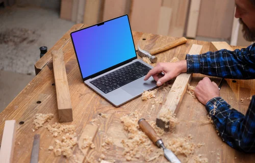 Carpenter scrolling on a MacBook Pro 14" mockup