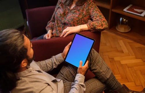 Co-workers in the office with iPad mockup