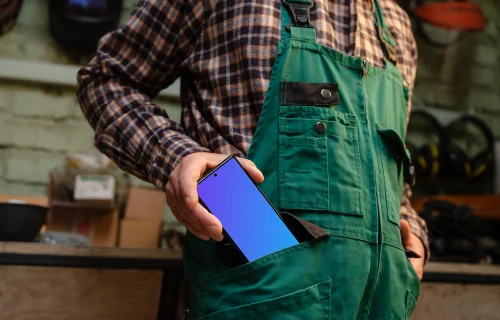 Crafter pulling out a phone from his pocket