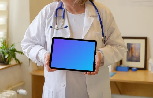 Doctor holding an iPad Air mockup