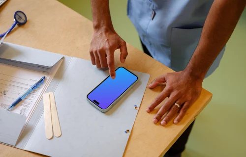 Doctor typing on a phone mockup