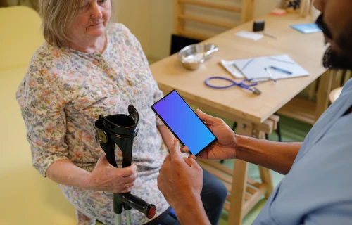 Doctor with Google Pixel 6 mockup in his hand