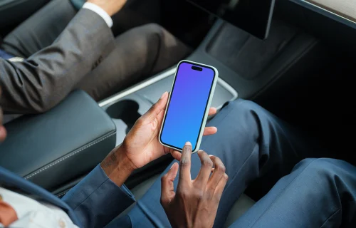Entrepreneurs in Tesla with iPhone 14 Pro mockup