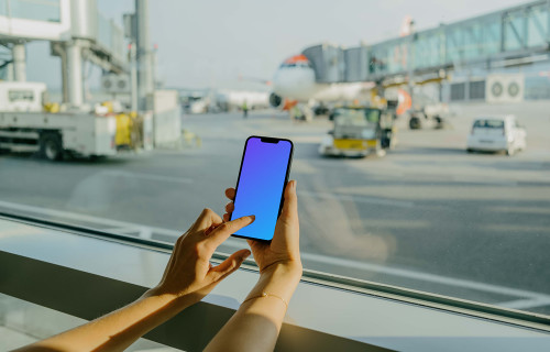 Female hand typing on a smartphone mockup