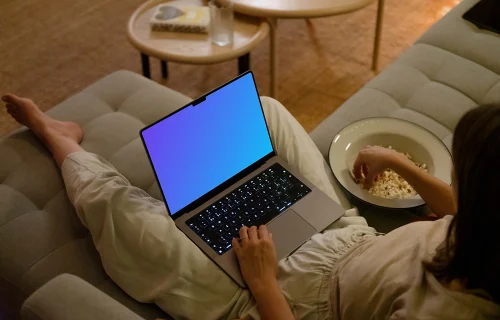 Female hand working on MacBook Pro mockup