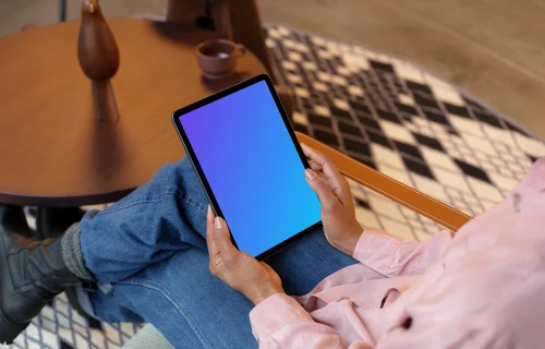 Female holding a tablet mockup