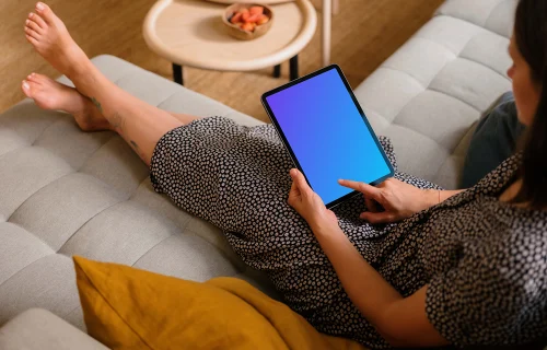 Female typing on an iPad Air mockup