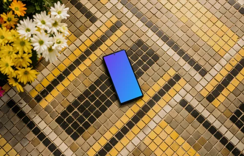 Google Pixel 6 mockup on a stone paving