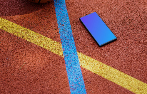 Google Pixel mockup on a basketball playground