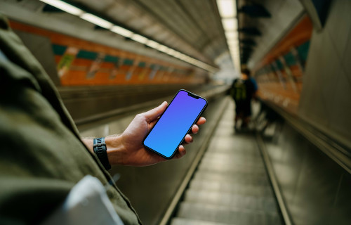 Hand holding a phone mockup