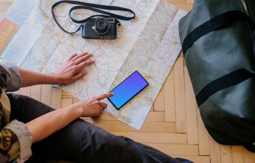 Hand pointing on a Google Pixel 6 mockup