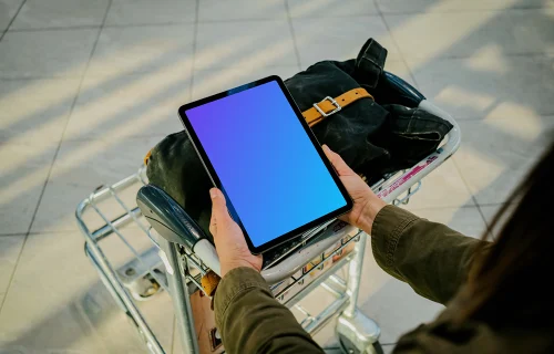 Hands holding an iPad Air mockup