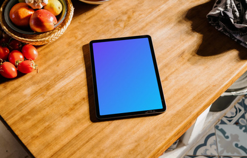 iPad Air mockup beside bowls of fruits