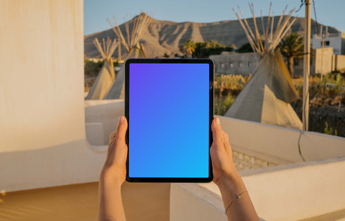 iPad Air mockup held up by a user