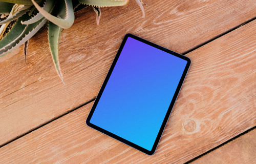 iPad Air mockup on a wooden floor