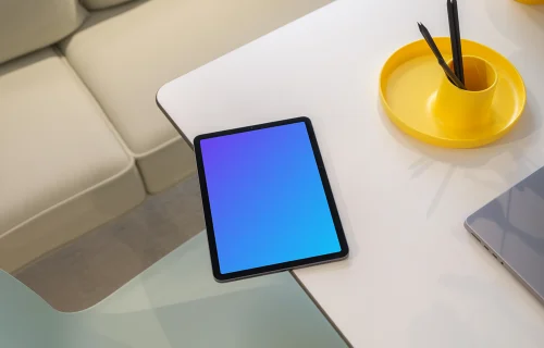 iPad Air mockup on modern glass table with creative accessories