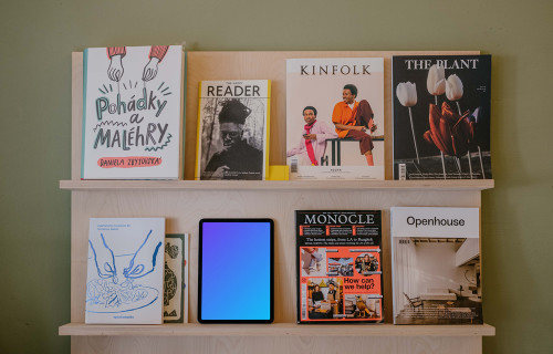 iPad Air mockup on the wall with magazines