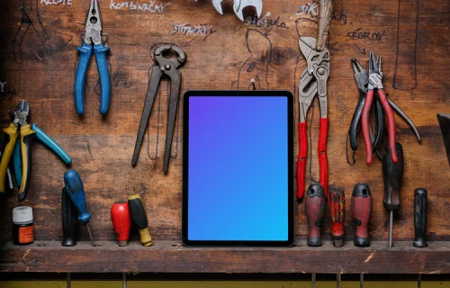 iPad Air mockup placed next to some work tools
