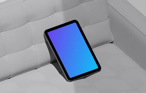 iPad Mini mockup on modern sofa