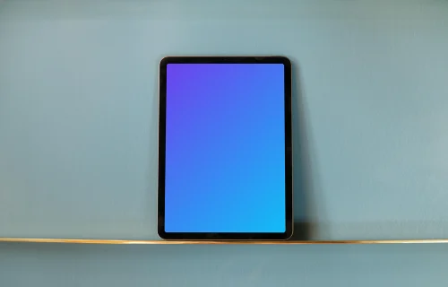 iPad mockup and solid baby blue background