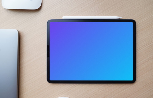 iPad mockup with pen on office desk