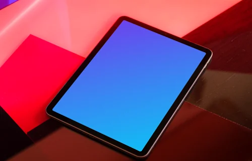 iPad mockup with red background