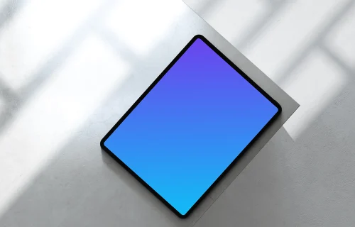 iPad Pro 11-inch mockup on marble surface with shadows