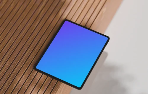 iPad Pro mockup on a wooden surface