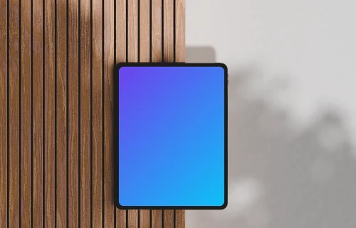 iPad Pro mockup on a wooden surface with shadows