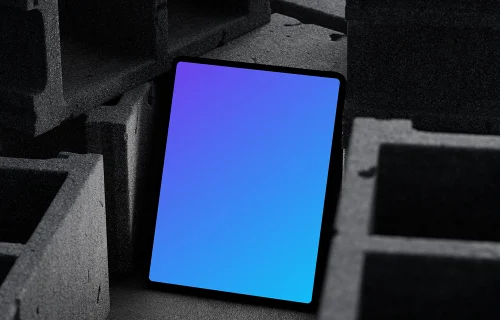 iPad Pro mockup placed on textured concrete blocks