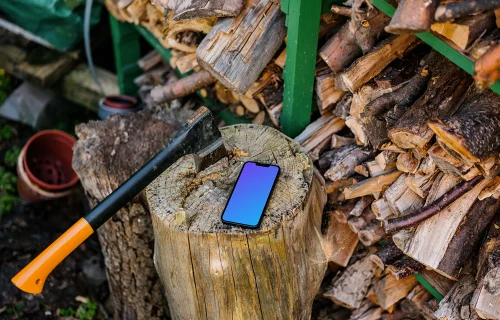 iPhone 13 mockup on a tree stump