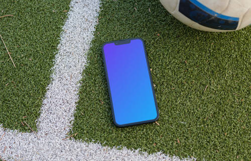 iPhone 13 mockup on the grass