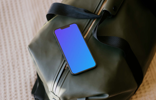iPhone 13 mockup on travel bag