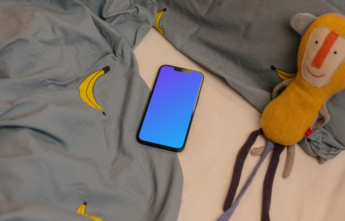 iPhone 13 mockup with stuffed animals