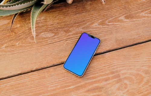 iPhone 13 Pro mockup beside an aloe plant