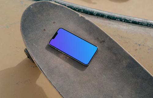 iPhone 13 Pro mockup on a skateboard