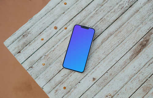 iPhone 13 Pro mockup on a wooden platform