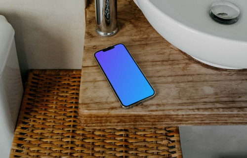 iPhone 13 Pro mockup on a wooden table