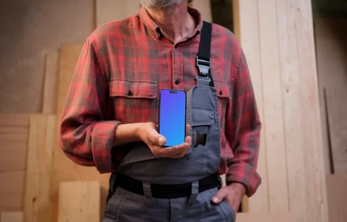 iPhone 14 Pro held by crafter
