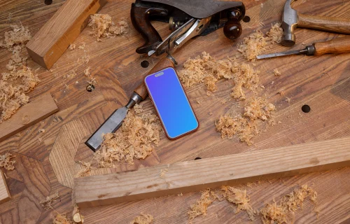 iPhone 14 Pro surrounded by carpentry tools