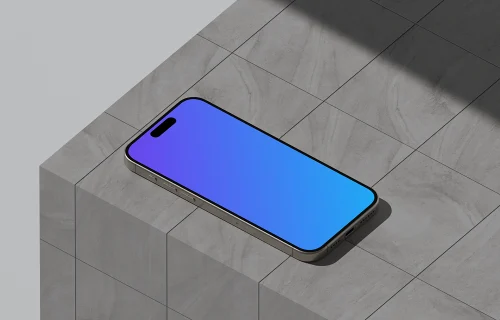 iPhone 16 mockup on a tiled surface with shadow