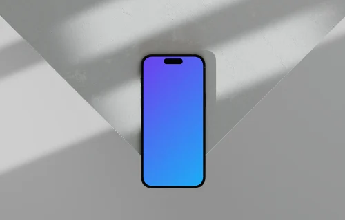 iPhone 16 mockup on marble in natural light