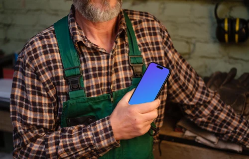 iPhone mockup held by the mechanic