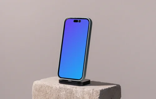 iPhone mockup on a concrete brick